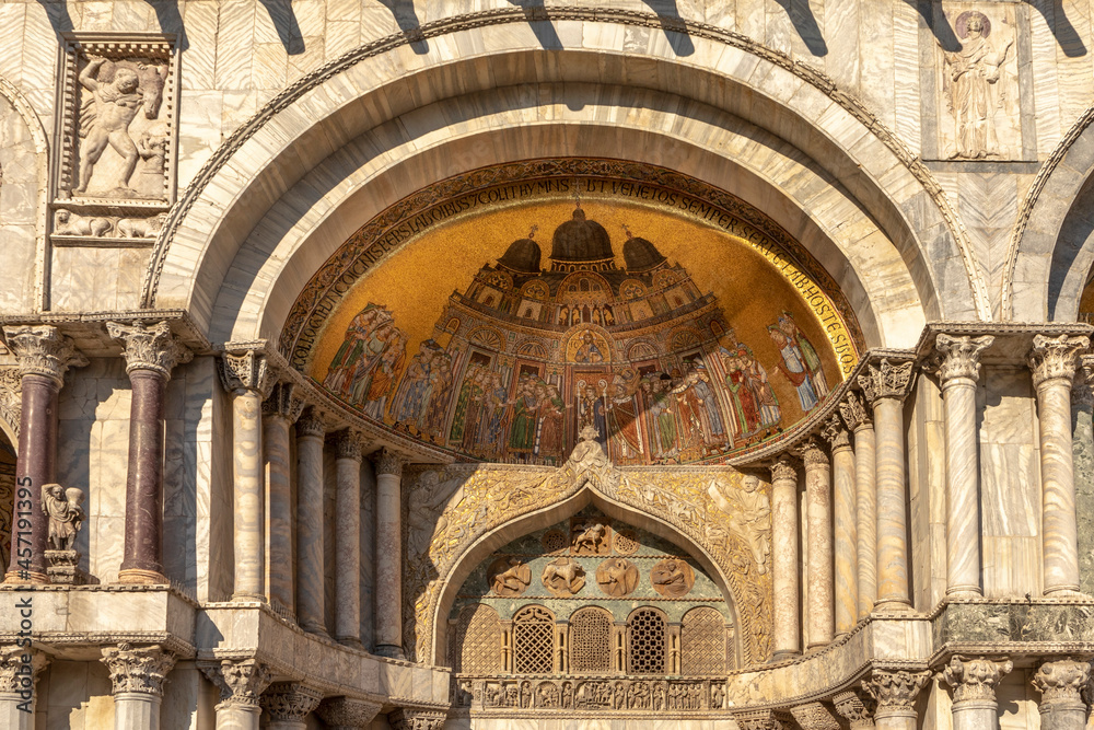 Fototapeta premium Fresco mosaic on the entrance facade of St. Mark's Basilica at St. Marks Square in Venice