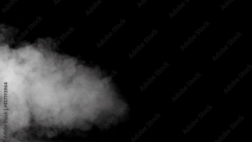 A jet of smoke in slow motion on dark background. Realistic atmospheric gray smoke. Abstract haze cloud. Mist effect and smoke stream effect in 4K. A jet of smoke in slow motion on dark background. Realistic atmospheric gray smoke. Abstract haze cloud. Mist effect and smoke stream effect in 4K.