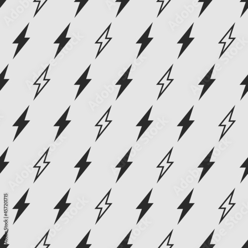 Seamless pattern with icons of black lightning bolts on grey background. Vector 10 EPS illustration.