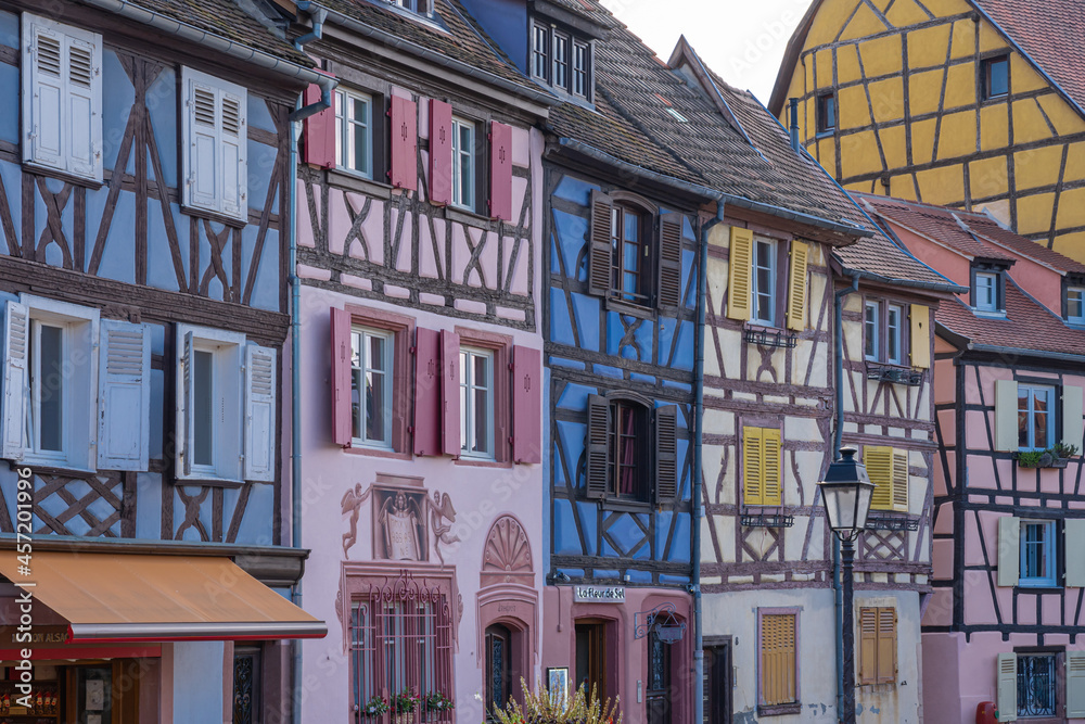 Obraz premium Colmar, France - 09 16 2021: Typical houses and colorful facades in the little Venice.