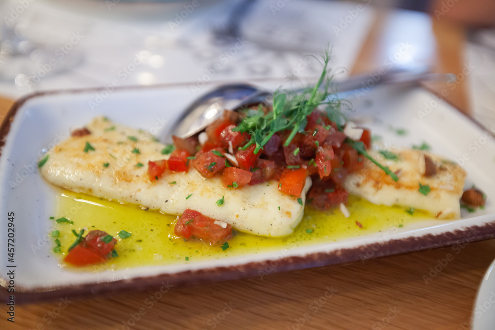 Grilled cheese with olive oil on the plate