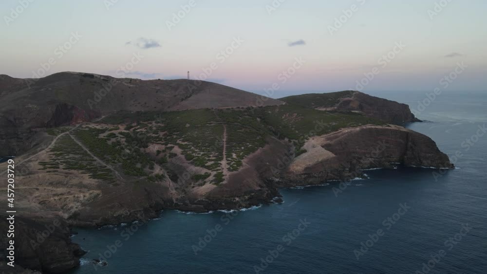 Ilheu de Ferro island at sunset, Porto Santo in Portugal. Aerial forward approach Ilheu de Ferro island at sunset, Porto Santo in Portugal. Aerial forward approach