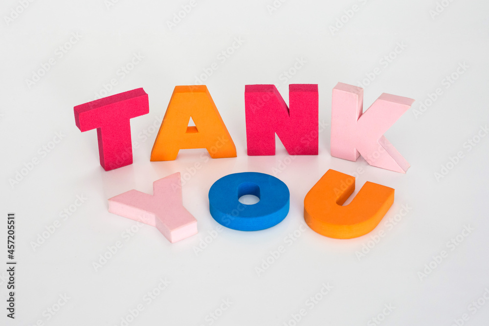 Naklejka premium Word made up of multicolored letters. Tank you