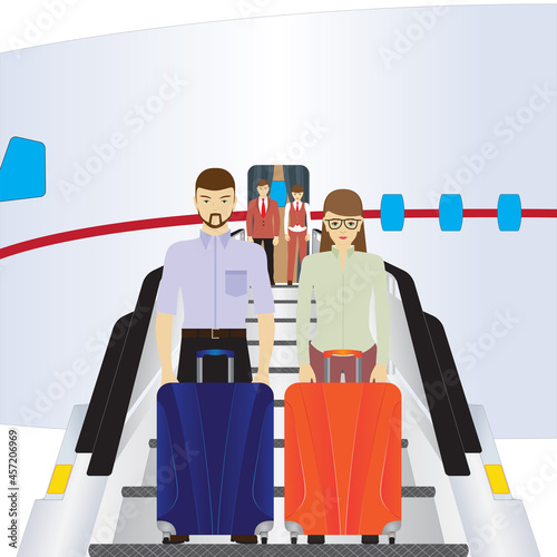 Passengers stand on the plane's ladder.
