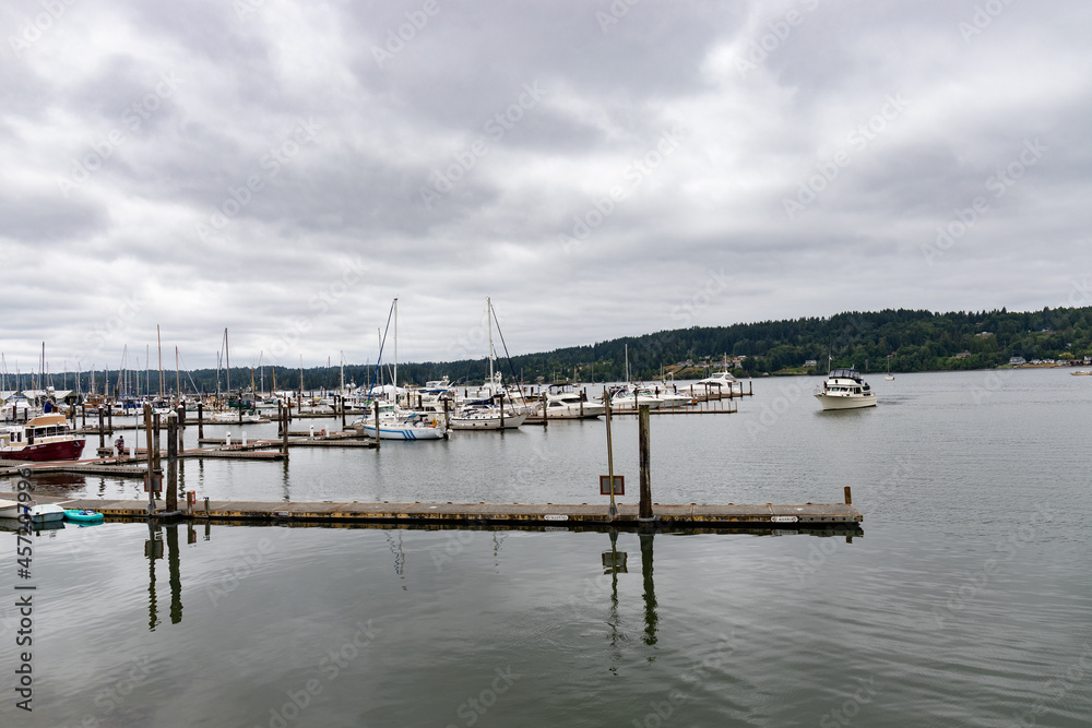Dock at a Marina with Yachts and Sailboats on a Cloudy Day