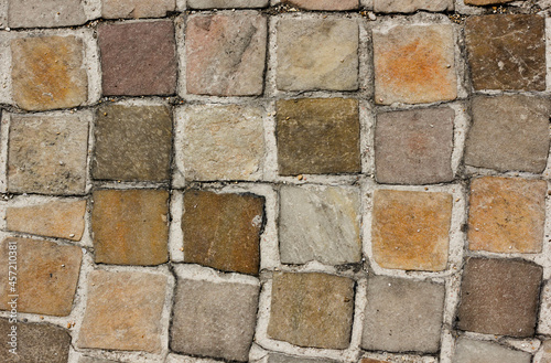 mosaic floor background, with tiles of different colors 