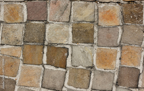 mosaic floor background, with tiles of different colors 