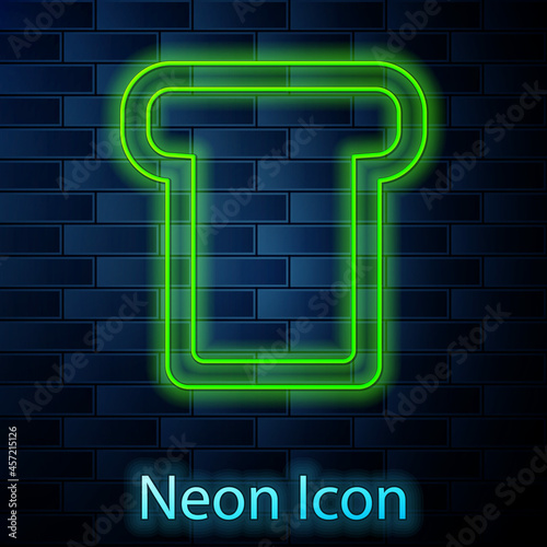 Glowing neon line Bread toast for sandwich piece of roasted crouton icon isolated on brick wall background. Lunch, dinner, breakfast snack. Vector