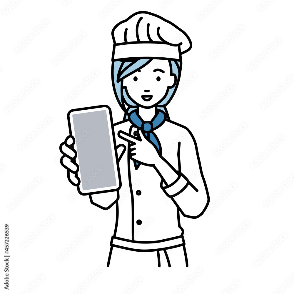 立ってスマートフォンを指差してこちらに向けて見せている調理師の女性