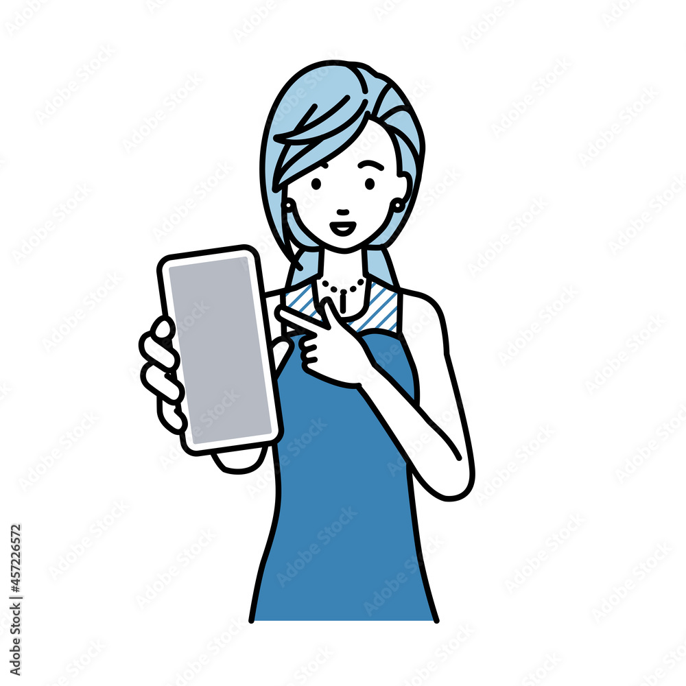 立ってスマートフォンを指差してこちらに向けて見せているドレスの女性 立ってスマートフォンを指差してこちらに向けて見せているドレスの女性