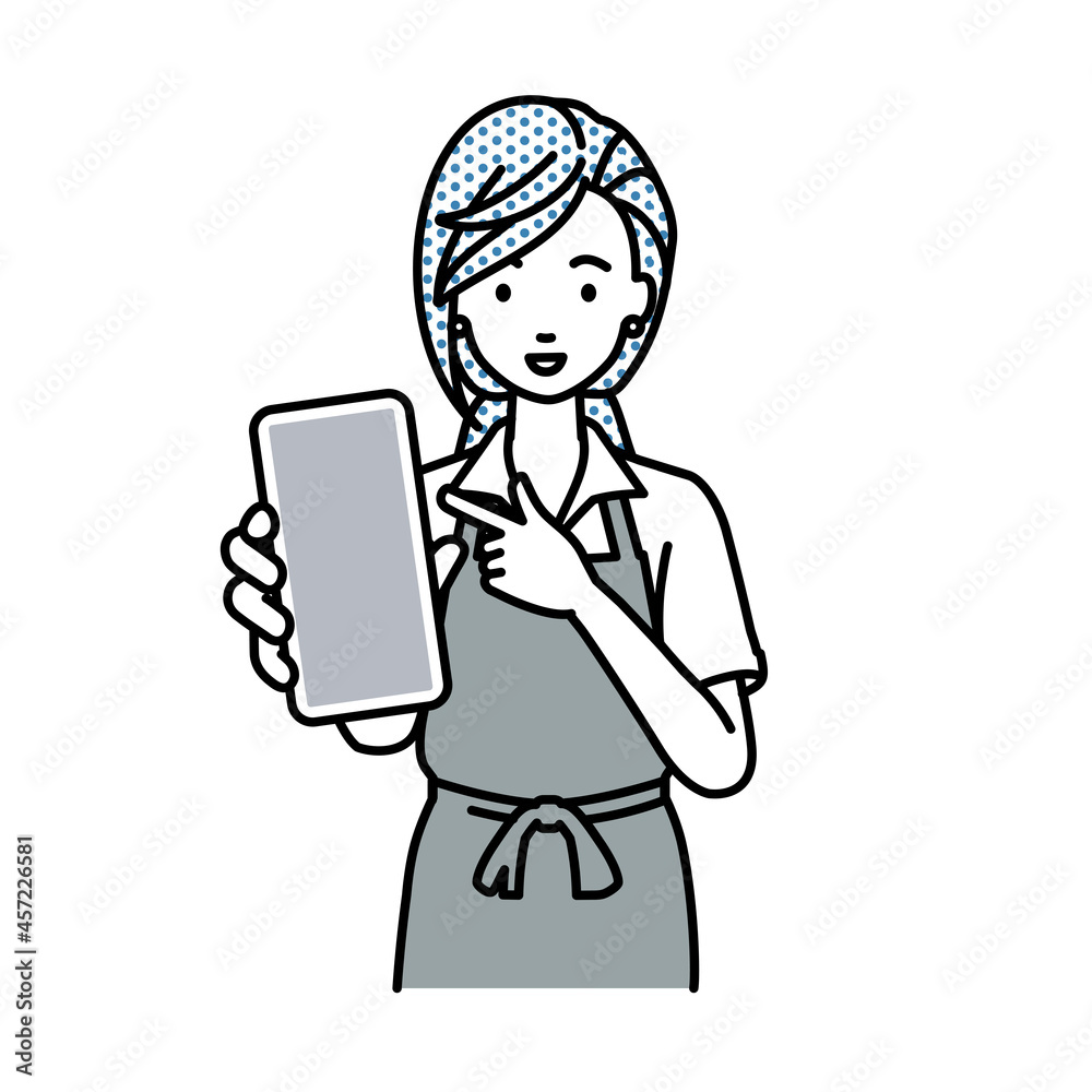立ってスマートフォンを指差してこちらに向けて見せているカフェ店員の女性 立ってスマートフォンを指差してこちらに向けて見せているカフェ店員の女性