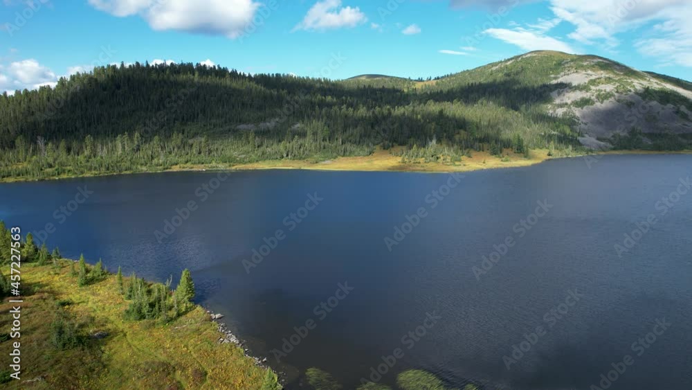 Flight over the lake in the National Park, aerial video filming Flight over the lake in the National Park, aerial video filming