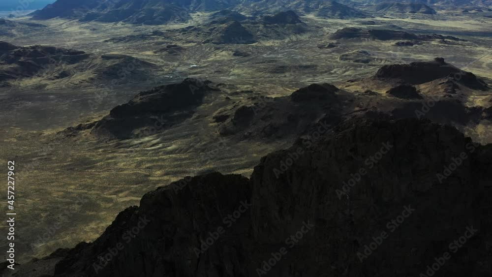 Drone Aerial View, Desert Landscape and Steep Cliffs Above Bonneville Salt Flats Utah USA Drone Aerial View, Desert Landscape and Steep Cliffs Above Bonneville Salt Flats Utah USA