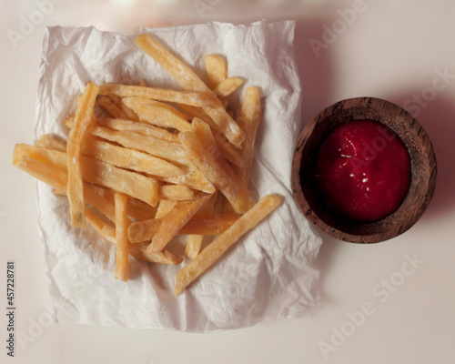 Crispy and savory fries. French fries are usually used as a side dish for heavy meals such as after eating a burger, then French fries are suitable for ending a meal. French fries mockup. focus blur.