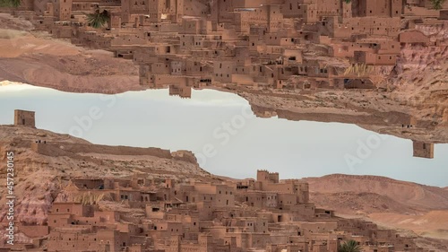 Earthen Clay Building Structures In Ait Benhaddou, Morocco. UNESCO World Heritage Site. flipped video, hyperlapse mirror effect photo