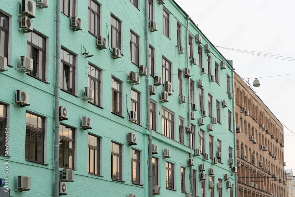 Naklejka premium green building facade in the city