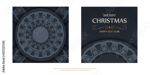 Postcard template Merry Christmas and Happy New Year in dark blue color with luxury blue ornaments