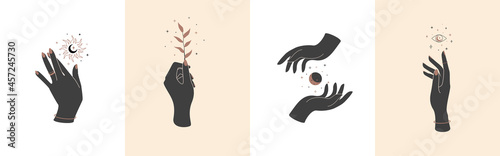 Set of magic hands with celestial mystical symbols. Spiritual boho logo, design elements with moon, plant, sun and eye. Black silhouette of woman arms isolated on white. Vector illustration