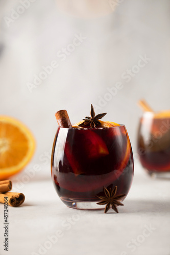 Photography Homemade red mulled wine on table with ingredients