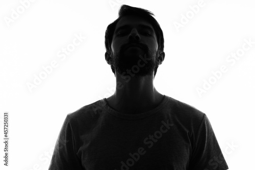 man gesturing with his hands silhouette light background anonymity