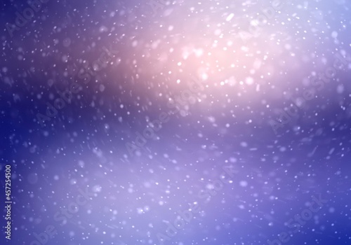 Snowflakes vortex on blue winter airy background. Blurred texture. Defocus landscape. 