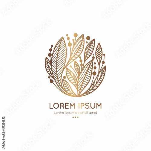 Golden emblem with leaves in a circle shape. Can be used for jewelry  beauty and fashion industry. Great for logo  monogram  invitation  flyer  menu  background  or any desired idea.