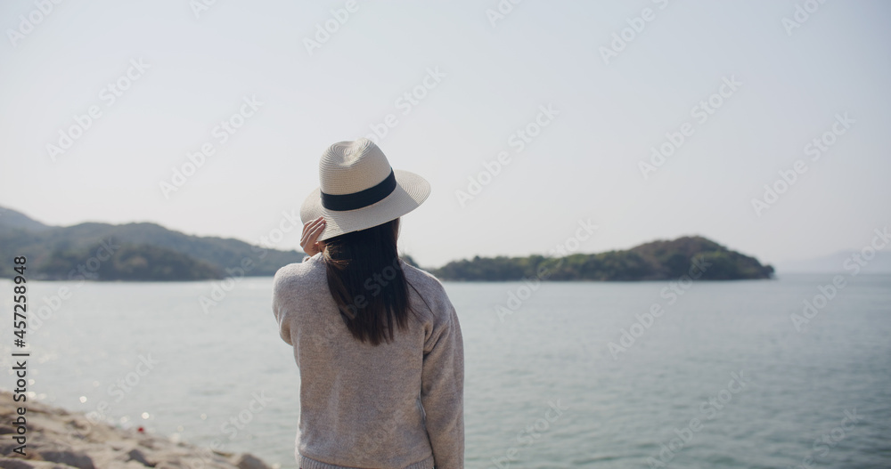 Woman look at the sea Woman look at the sea