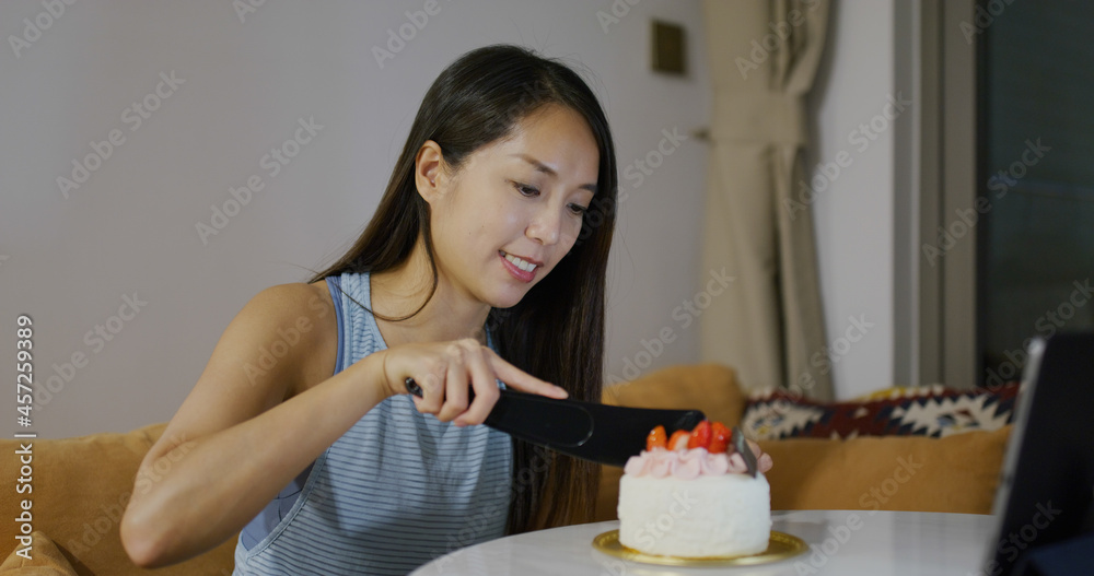 Woman celebrate birthday and make video call on tablet computer at home Woman celebrate birthday and make video call on tablet computer at home