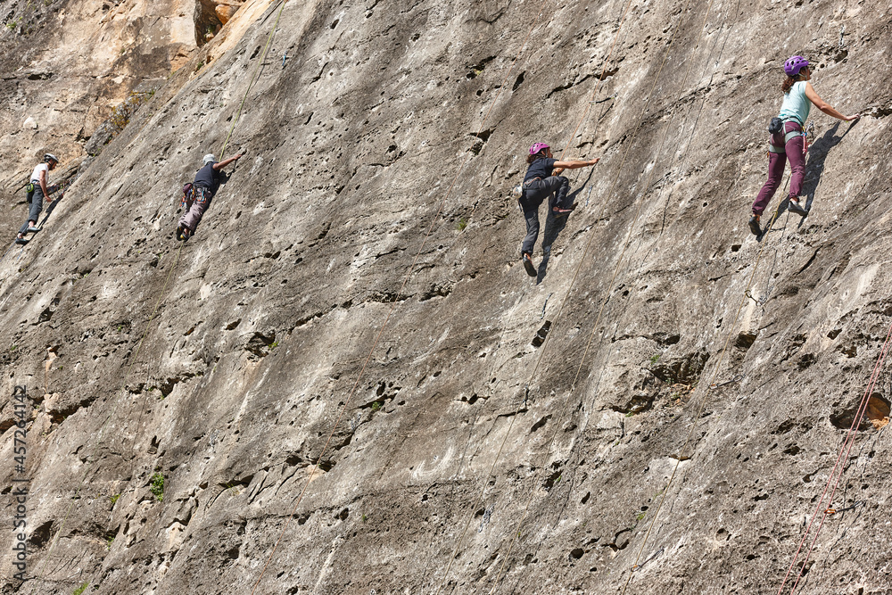 Climbers on a granite wall. Extreme sport. Outdoor activity