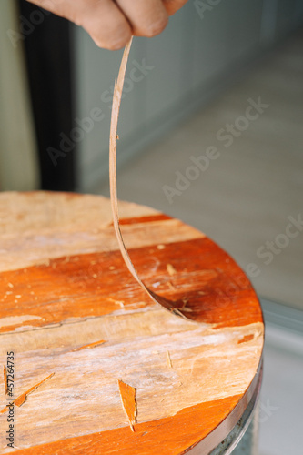 old table laminated peel spokeshave exotic hardwood board chip shavings