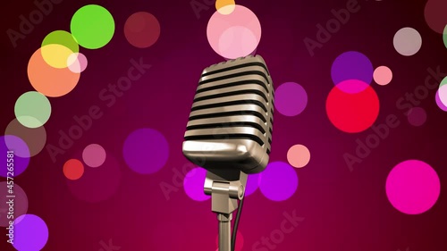 Golden retro microphone rotating on a stand. Colorful confetti flying background. Seamless looping