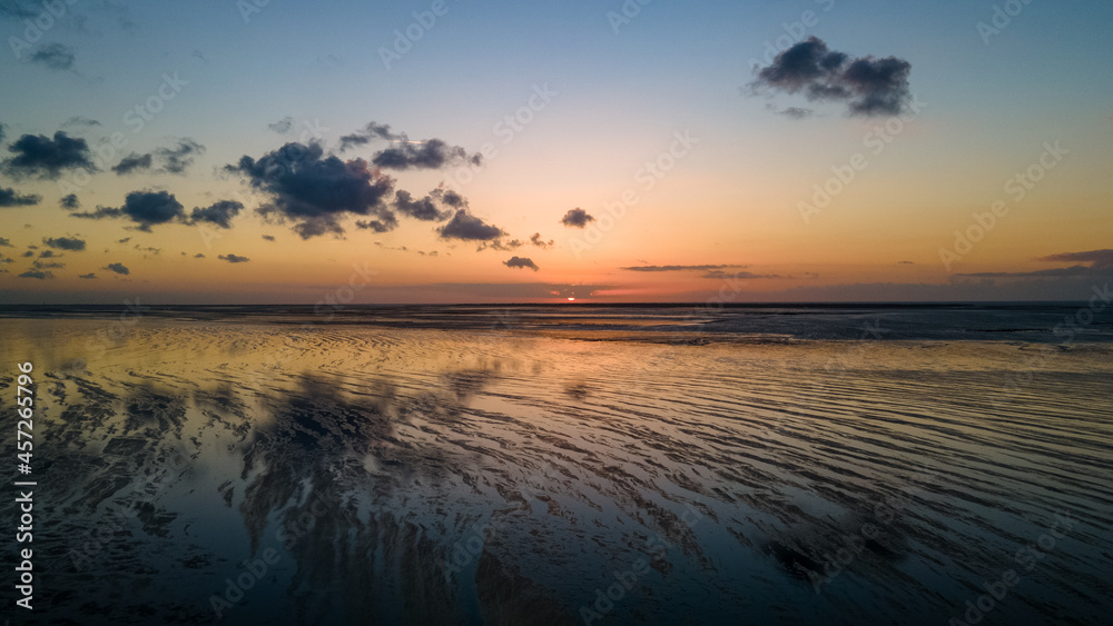 Sunset over the Wadden Sea at ebb in the North Sea - Drone Perspective Landscape Photography