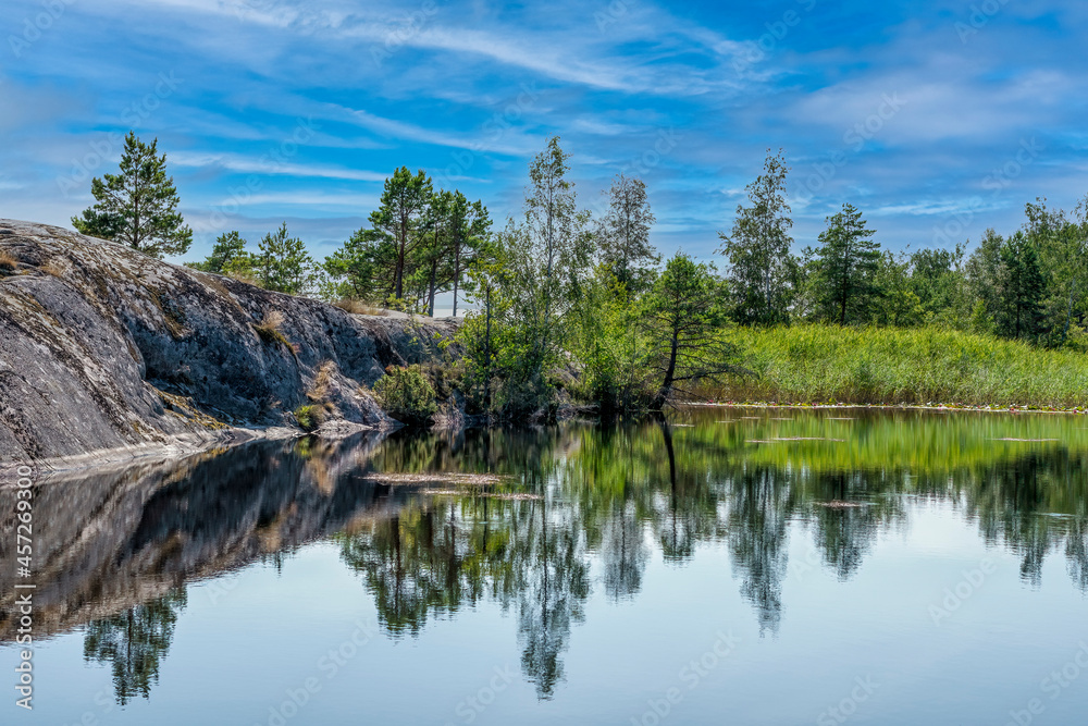 A nice lake on the island of Harstena in Gryt's archipelago, Sweden A nice lake on the island of Harstena in Gryt's archipelago, Sweden