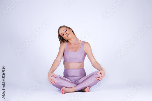 Beautiful pregnant woman practicing yoga © darezare