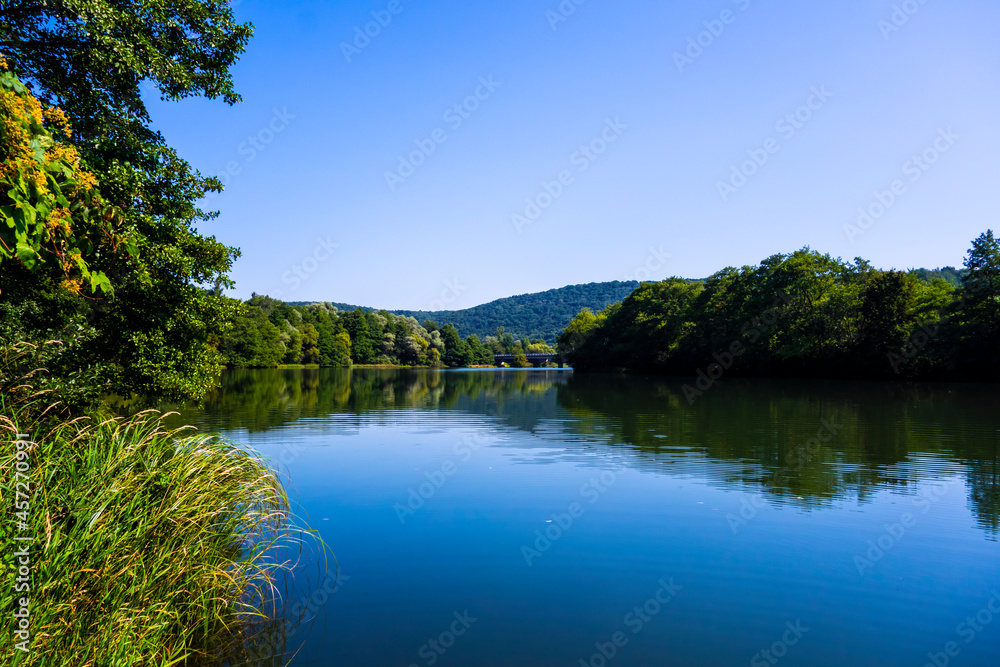 Beautiful scenery of the river nature and the bridge in the background