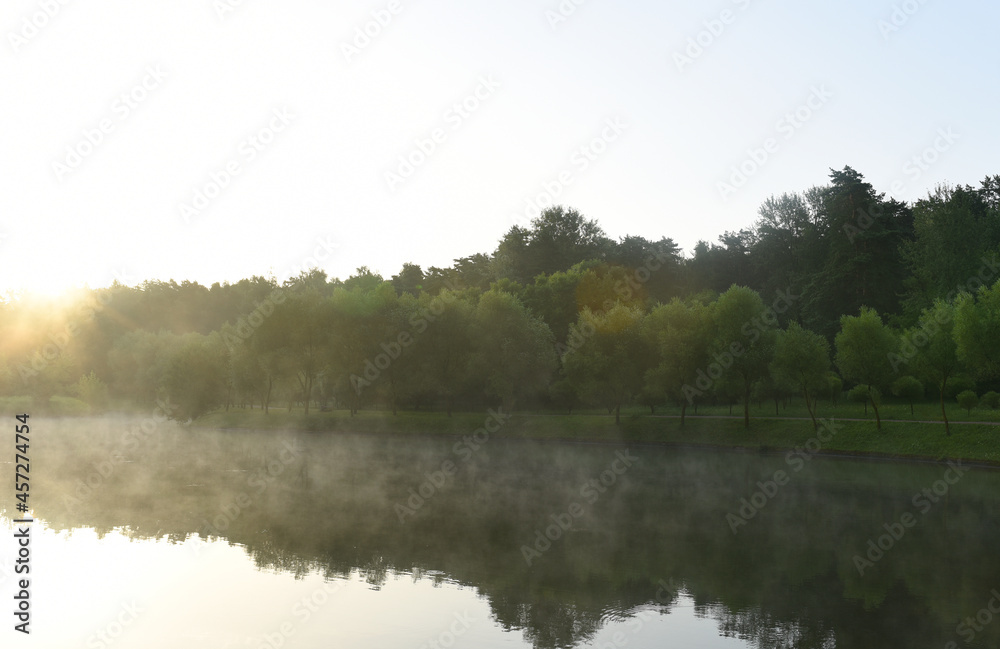 River in fog early in the morning at dawn. The concept of wildlife, fishing and relaxing alone. River in fog early in the morning at dawn. The concept of wildlife, fishing and relaxing alone.