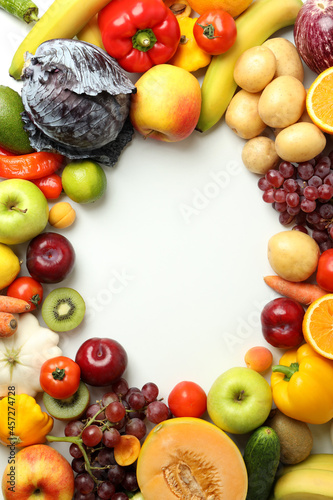 Set of different vegetables and fruits on white background