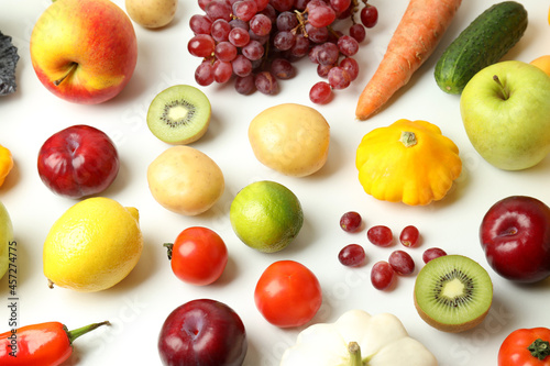 Set of different vegetables and fruits on white background