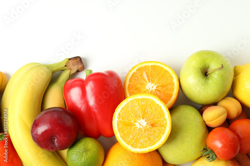 Set of different vegetables and fruits on white background