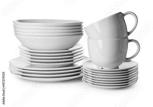 Different clean dishes on white background