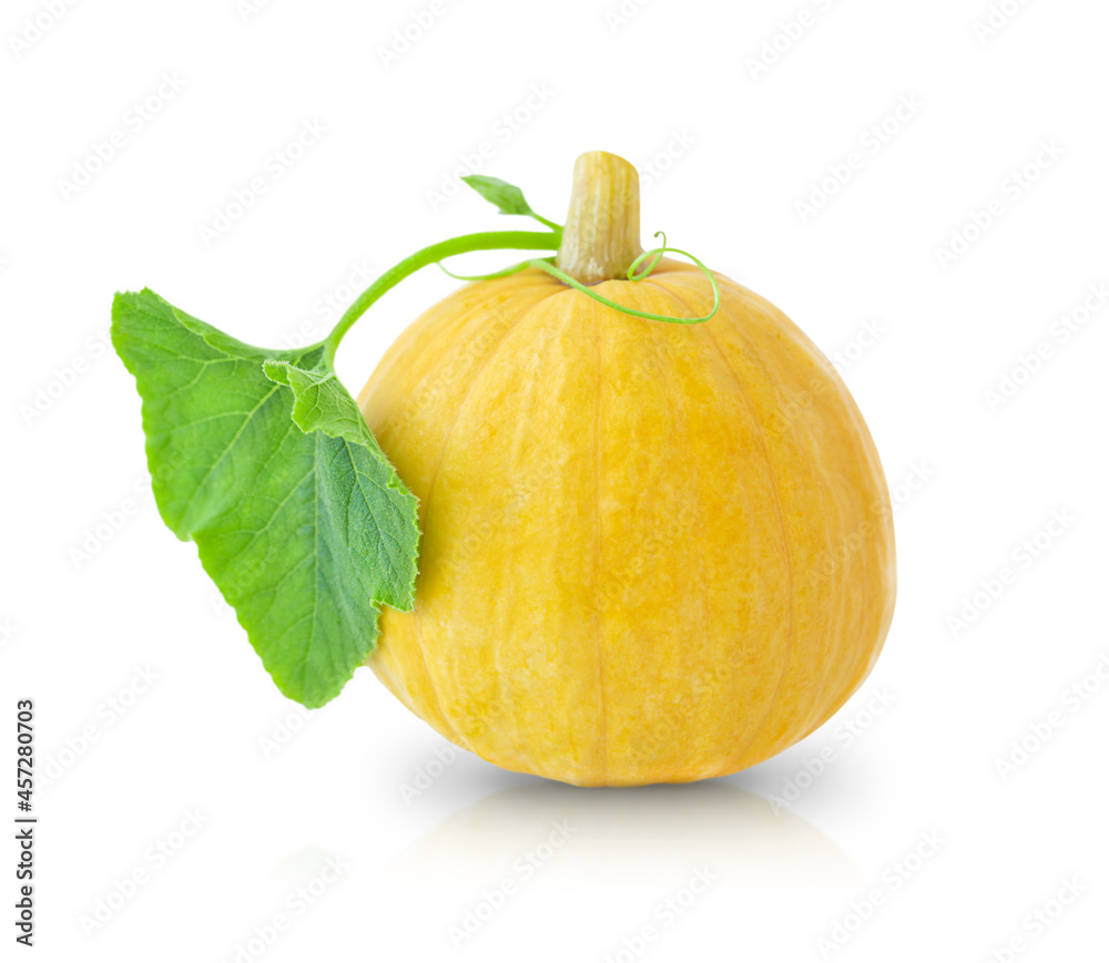 Yellow pumpkin with green leaf isolated on white background	
