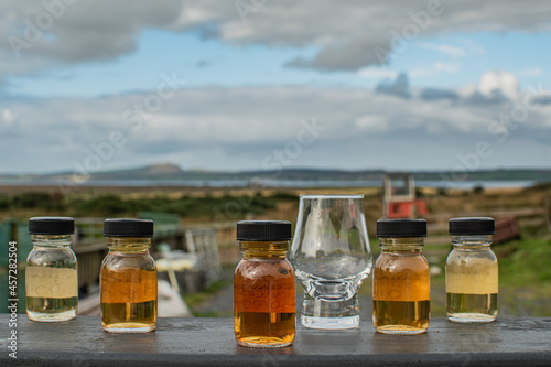 Whisky samples Scotch Islay drink variety of Whiskeys to taste in Islay Sunrise nature
