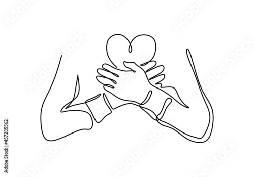 Continuous one line drawing of crossing hand on chest with heart shaped object. Hand hugging heart isolated on white background.