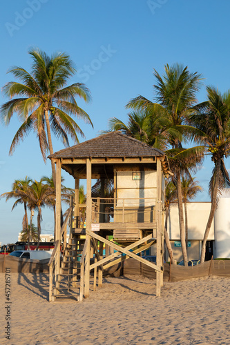 Vertical image of a wooden Lifeguard Stand in Deerfield Beach Florid on a summer day. photo