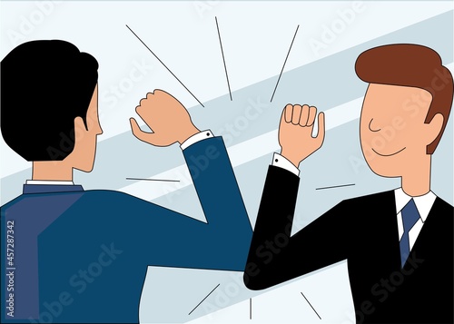 Colleagues in the office greet each other at work