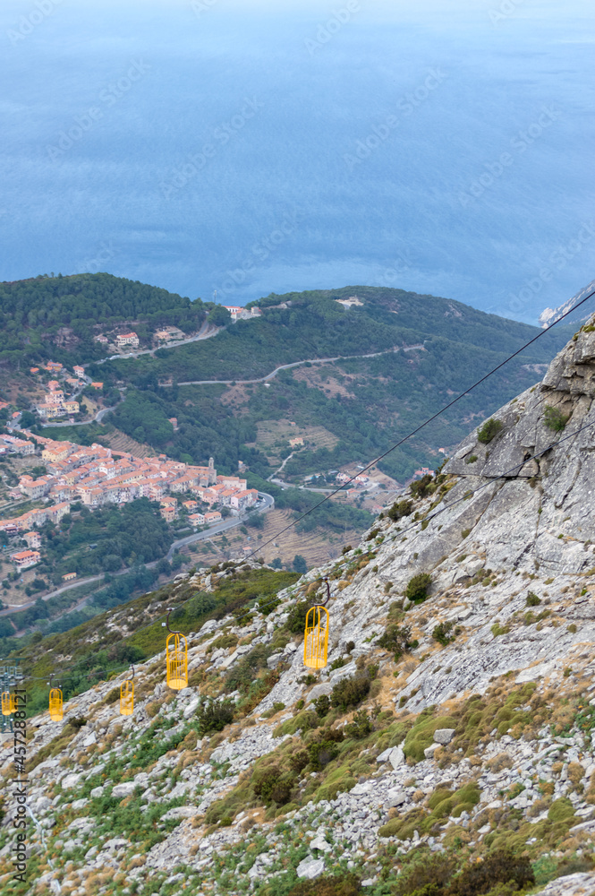 Fototapeta premium Cabin lift in Monte Capanne, Isola D'Elba. The best aerial view of this nice mediterranean island