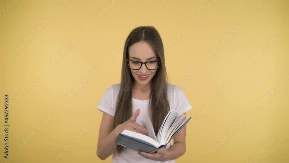 Young attractive woman 40 years old interested reading a book Young attractive woman 40 years old interested reading a book