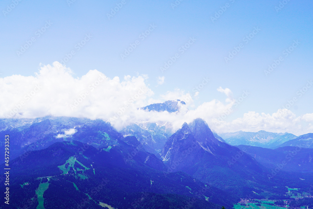 Fototapeta premium Wank mountain peaks near Garmisch-Partenkirchen, Bavaria. View from above of the surrounding landscape with mountains.