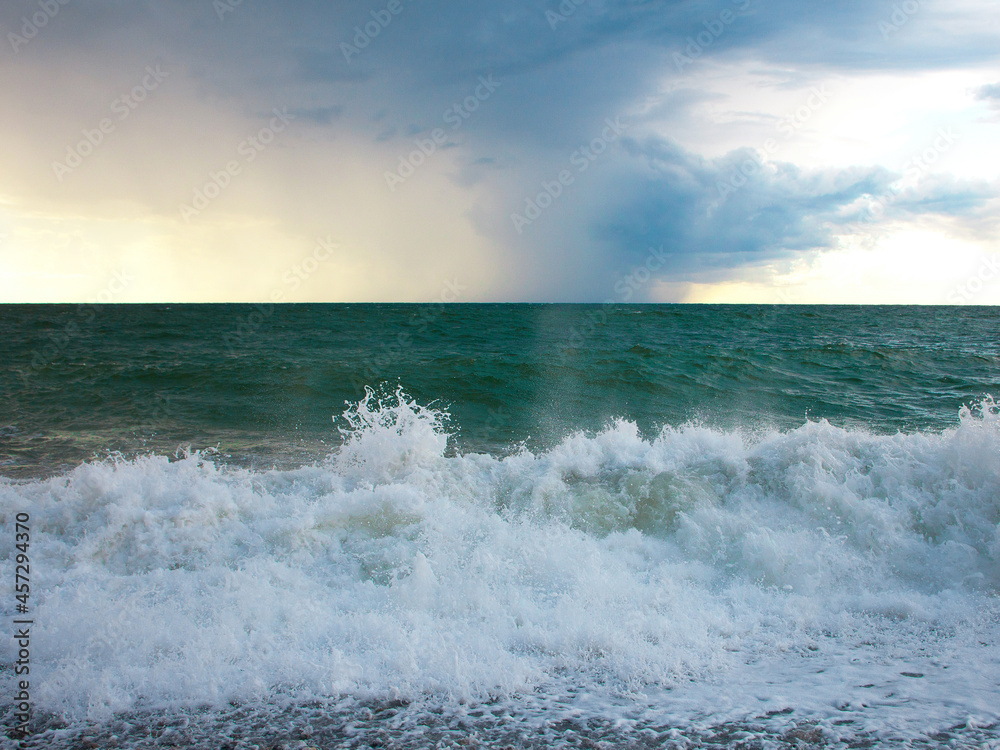 Fototapeta premium Turquoise sea with waves and foam
