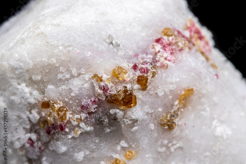 Macro mineral stone Spinel on a black background